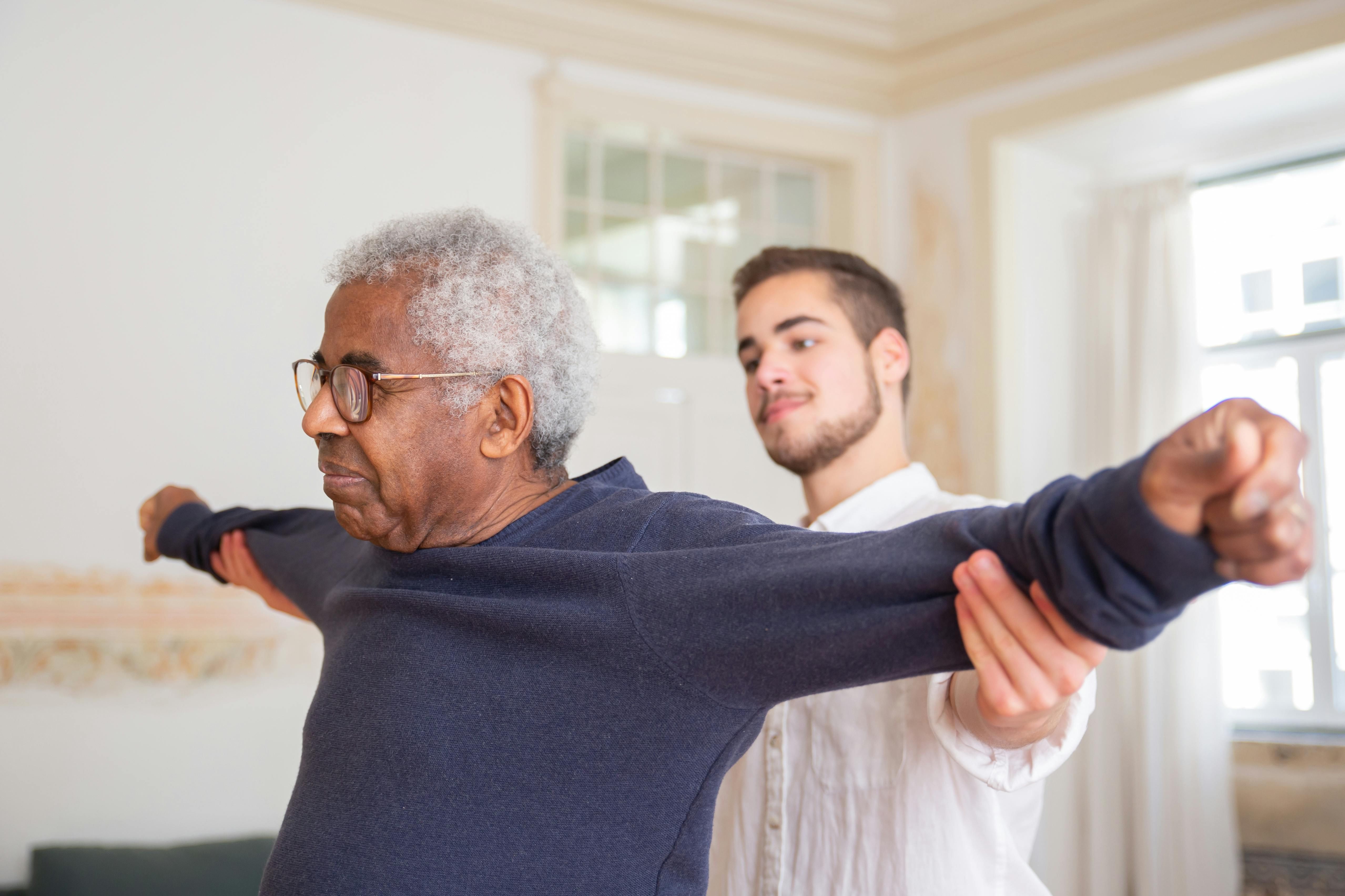 Resident in physical therapy session at The Waters